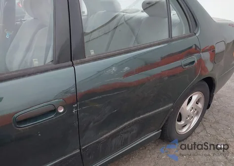 2000 Toyota Corolla Le from USA, damaged, VIN 1NXBR18E3YZ305285